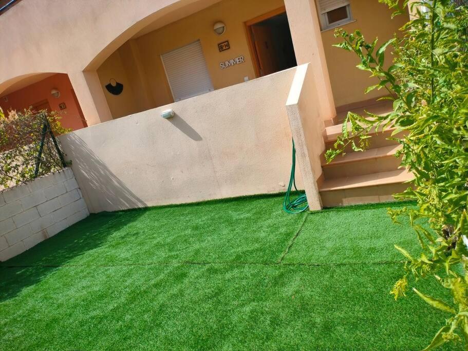 Bajo Con Jardin A Pie De Playa Y Piscina Comunitaria Con Jacuzzi Apartment Playas de Vera Exterior photo